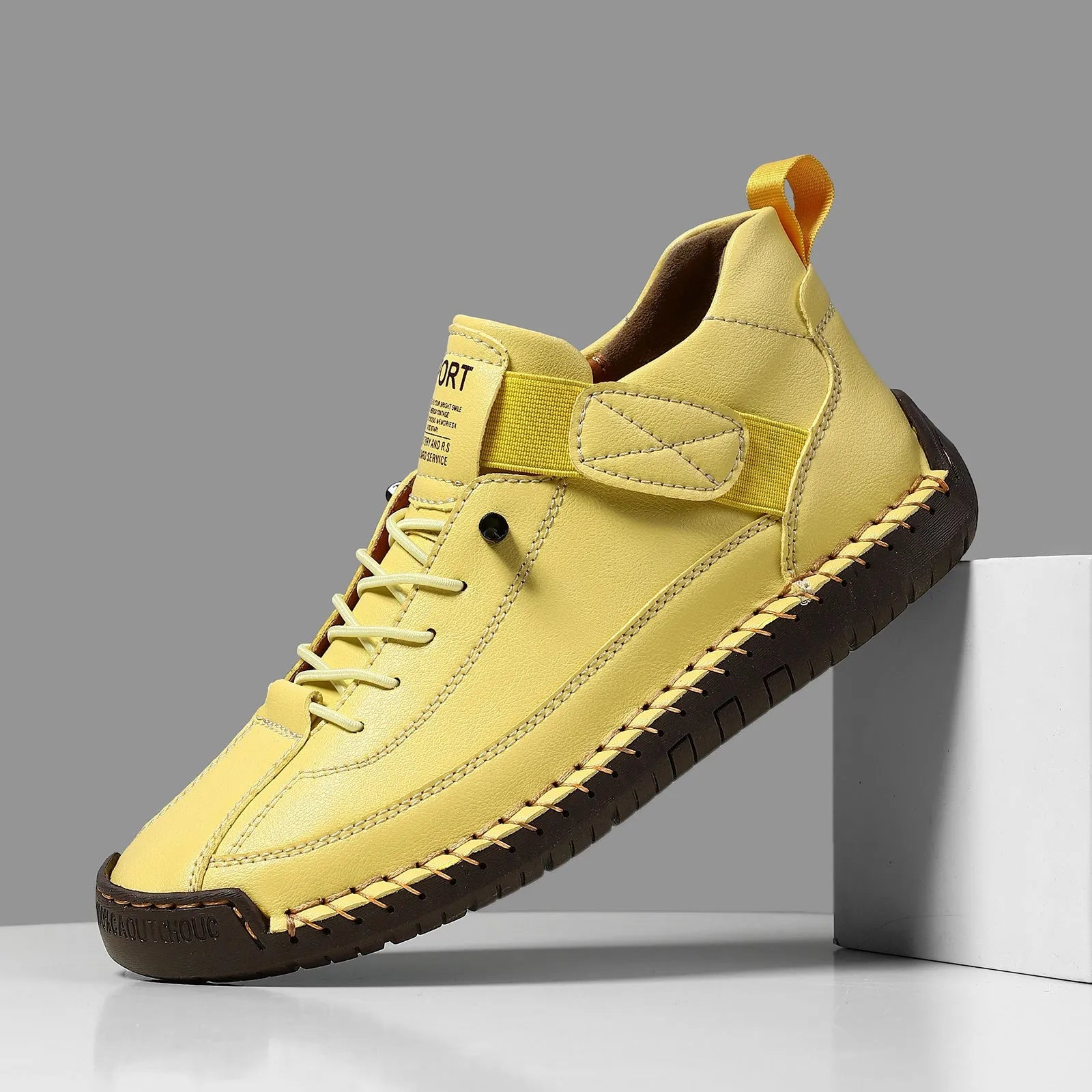 Men's mid-top Martin boots with microfiber upper, leather lining, and rubber sole in solid colour options for winter outdoor wear.