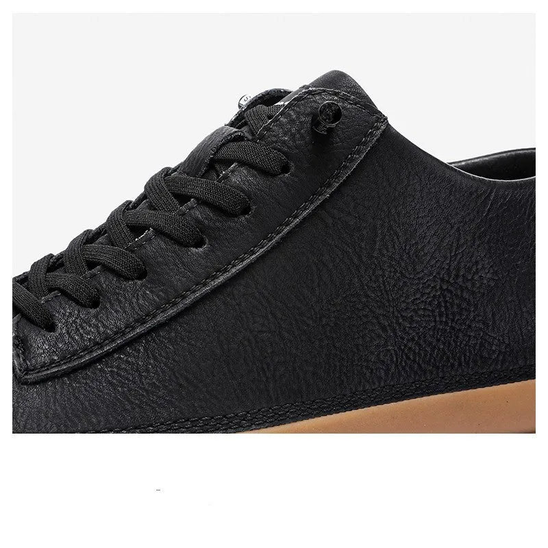 Men's black leather lace-up casual shoes with a round toe and flat rubber sole.