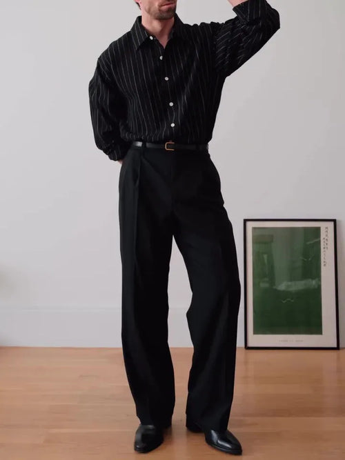Black pinstriped polyester button-down shirt for men on a hanger, showing regular fit.