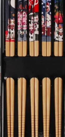 Set of five pairs of bamboo chopsticks with Japanese lucky cat and elegant blue cartoon patterns.