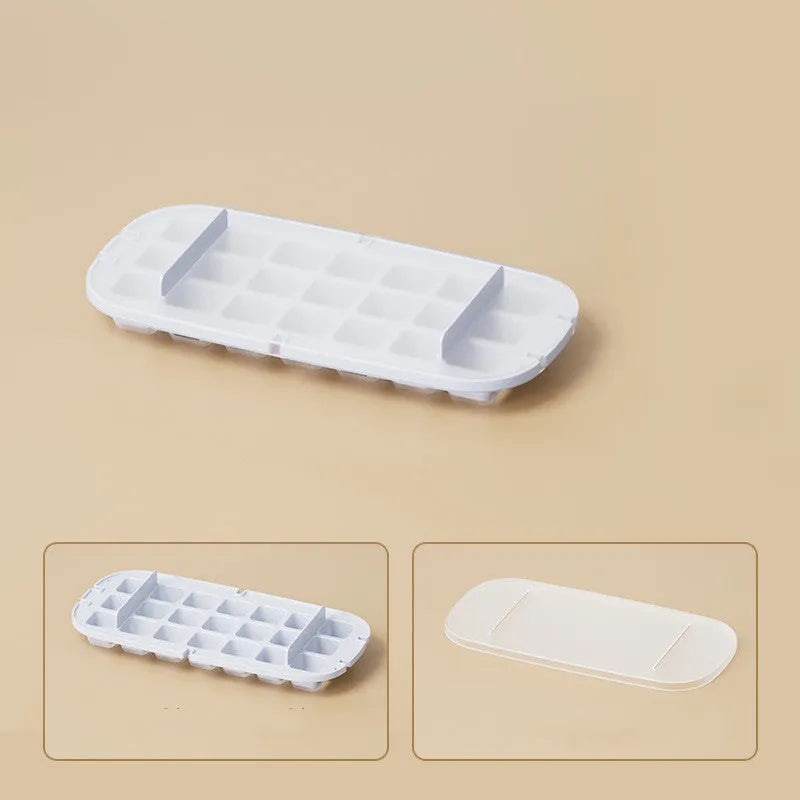 Yellow high-capacity grid ice cube tray with integrated storage slot for an ice shovel