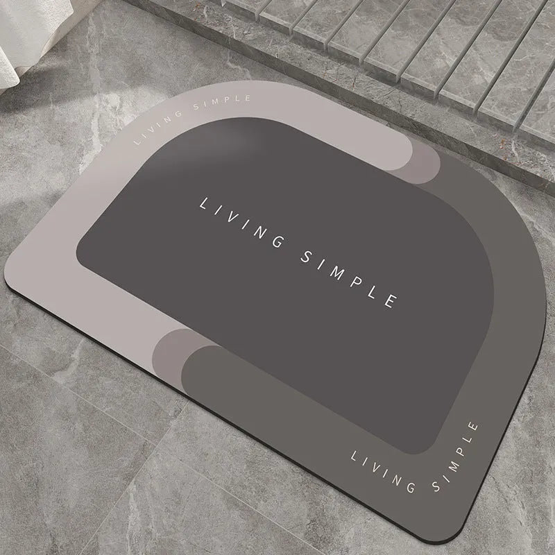 Super absorbent oval bath mat in grey with non-slip rubber bottom, 40x60cm