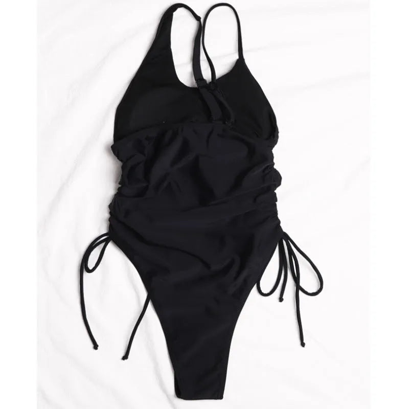 Black sleeveless bodycon dress with lacing and sloping shoulder, tight fit, 70-80cm length, sizes S-XL.