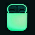 Luminous glow-in-the-dark silicone flip-top protective case for Apple AirPods on a dark background