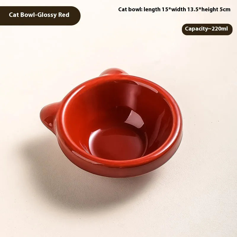 Porcelain cat drinking water bowl in bright red single grid configuration on surface