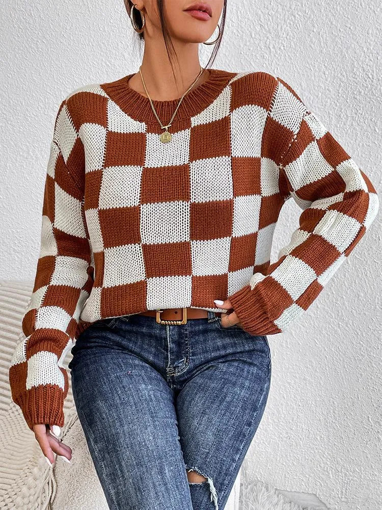 Dark brown plaid pattern acrylic pullover sweater with long sleeves and a round neck.