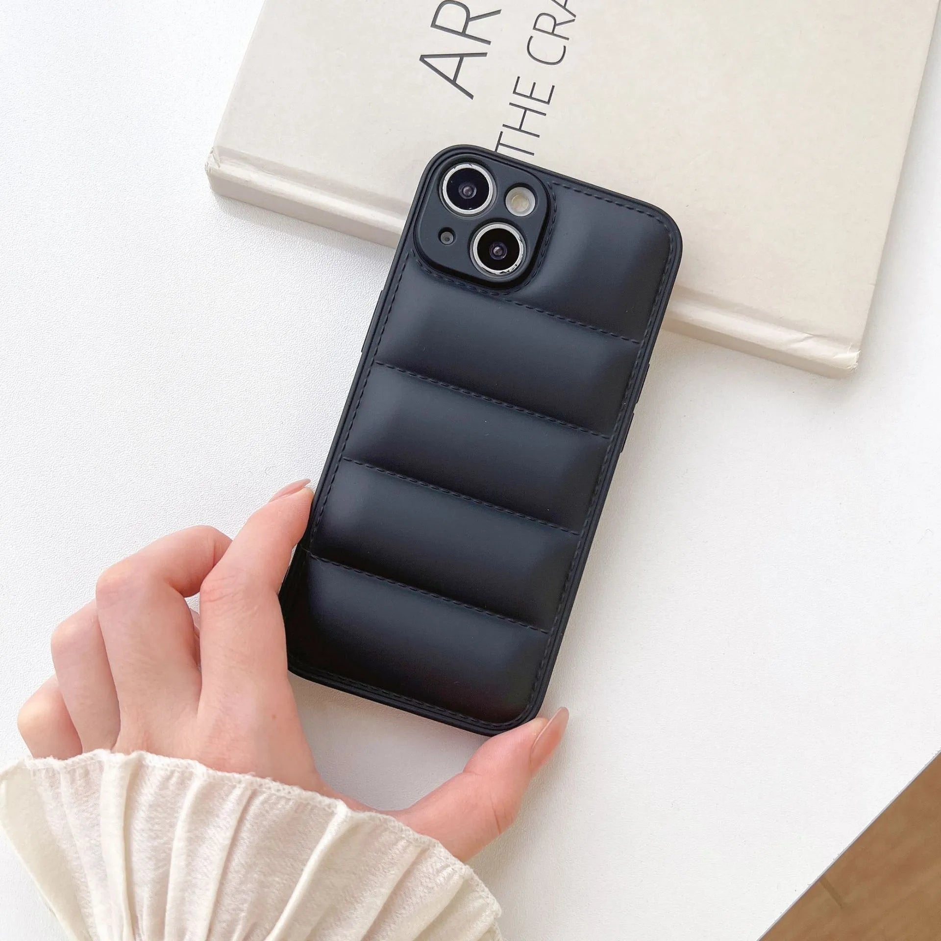 Plastic down jacket phone case for iPhone 15 series in black, shockproof TPU back cover