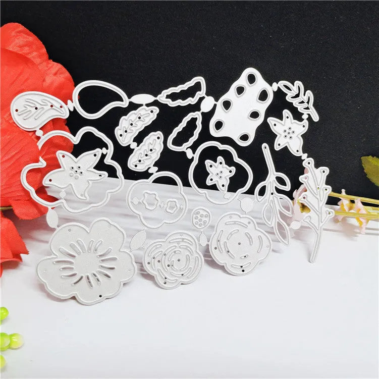 Silver carbon steel flower cutting die with plant etching pattern measuring 14.3 by 9.9 cm