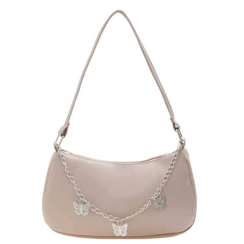 Butterfly chain shoulder crossbody bag in horizontal square shape with separate internal compartments
