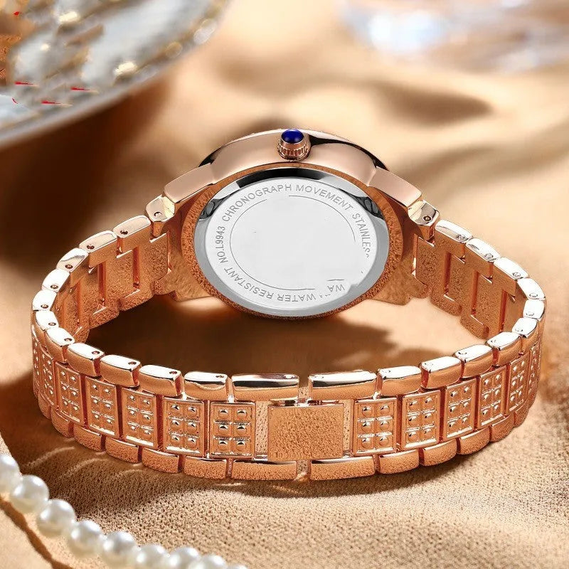 Women's quartz watch with 32mm dial, steel bracelet, Roman numeral face, and butterfly clasp