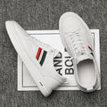 White casual lace-up leather shoes with inner height increase, round toe, rubber outsole, on a clean background