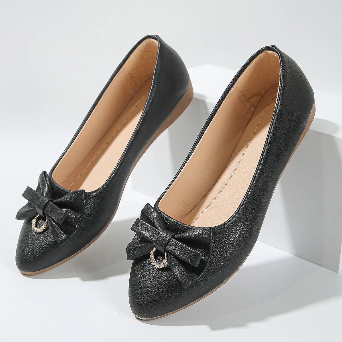 Women's beige casual loafers with bowknot detail and shallow mouth slip-on design