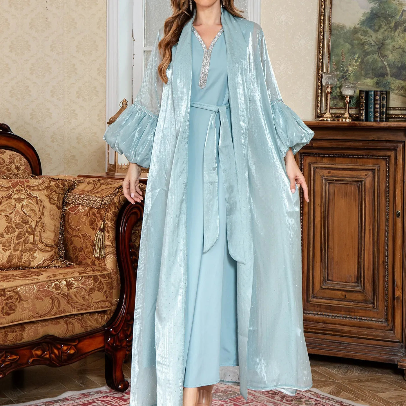 Brown Arabic two-piece dress with long sleeves, rhinestone detailing, and full-length skirt