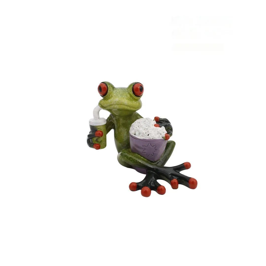 Pastoral style green resin frog decoration figurine on a wooden shelf.
