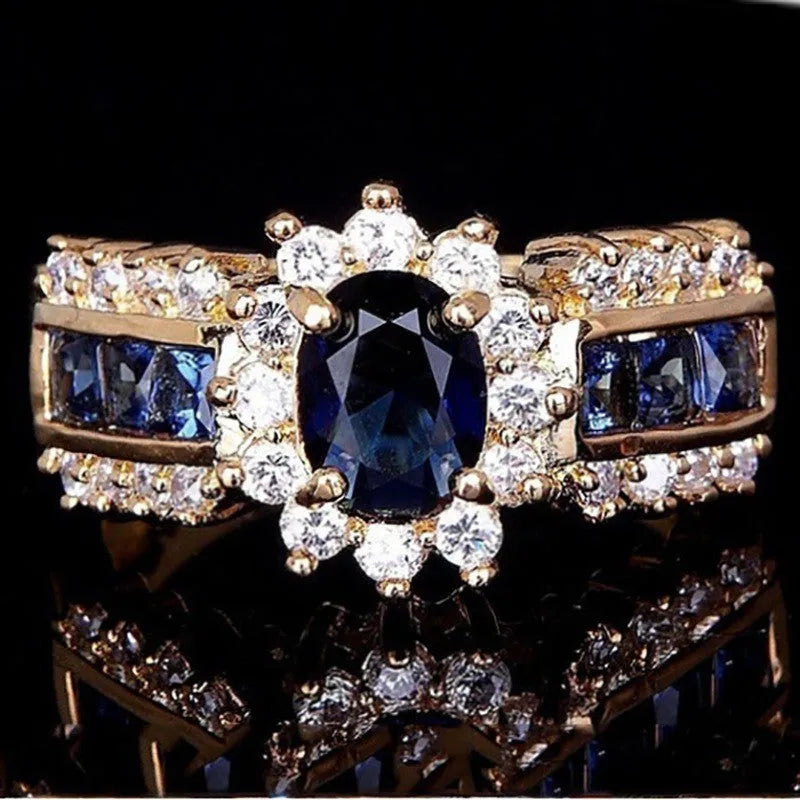 Personalised zinc alloy ring with cubic zirconia stones in sunflower blue, square blue, or square purple designs
