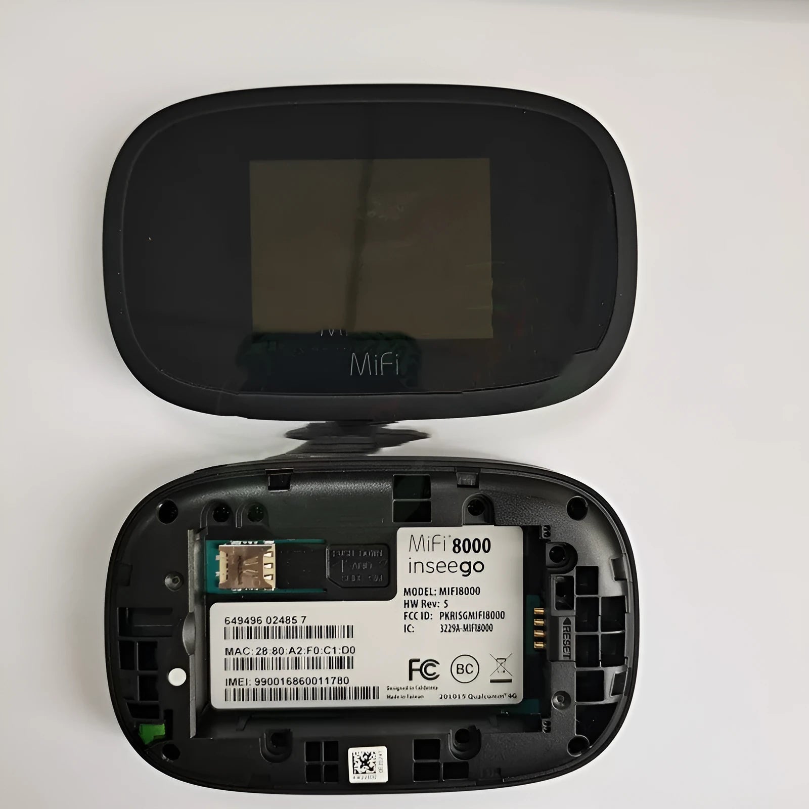 Black Full Network 4G portable wireless router with LCD screen, shown alongside a SIM card and battery.