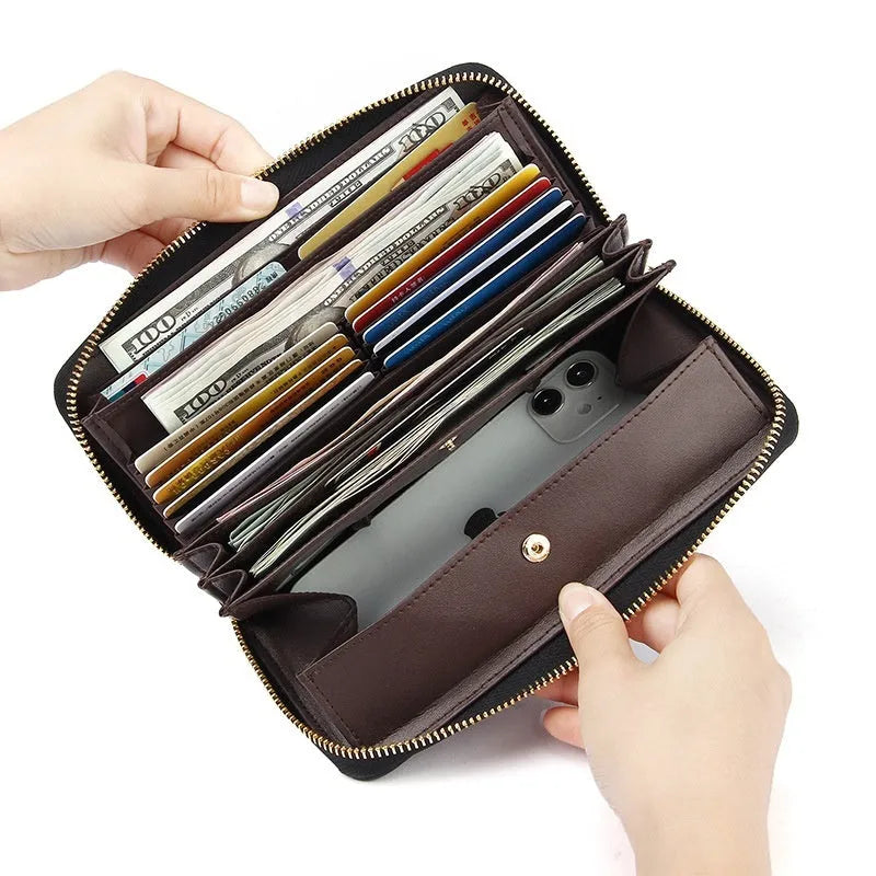 Long genuine leather women's wallet in a choice of colours, shown open to display multiple card slots and a large main compartment.