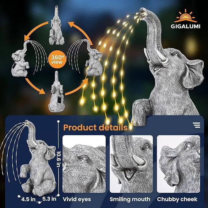 A textured resin elephant garden statue with a built-in LED light strip illuminating its back, placed amongst plants.