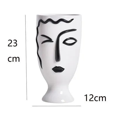 Modern minimalist ceramic vase with painted finish on a shelf, available in large or small size for home decoration