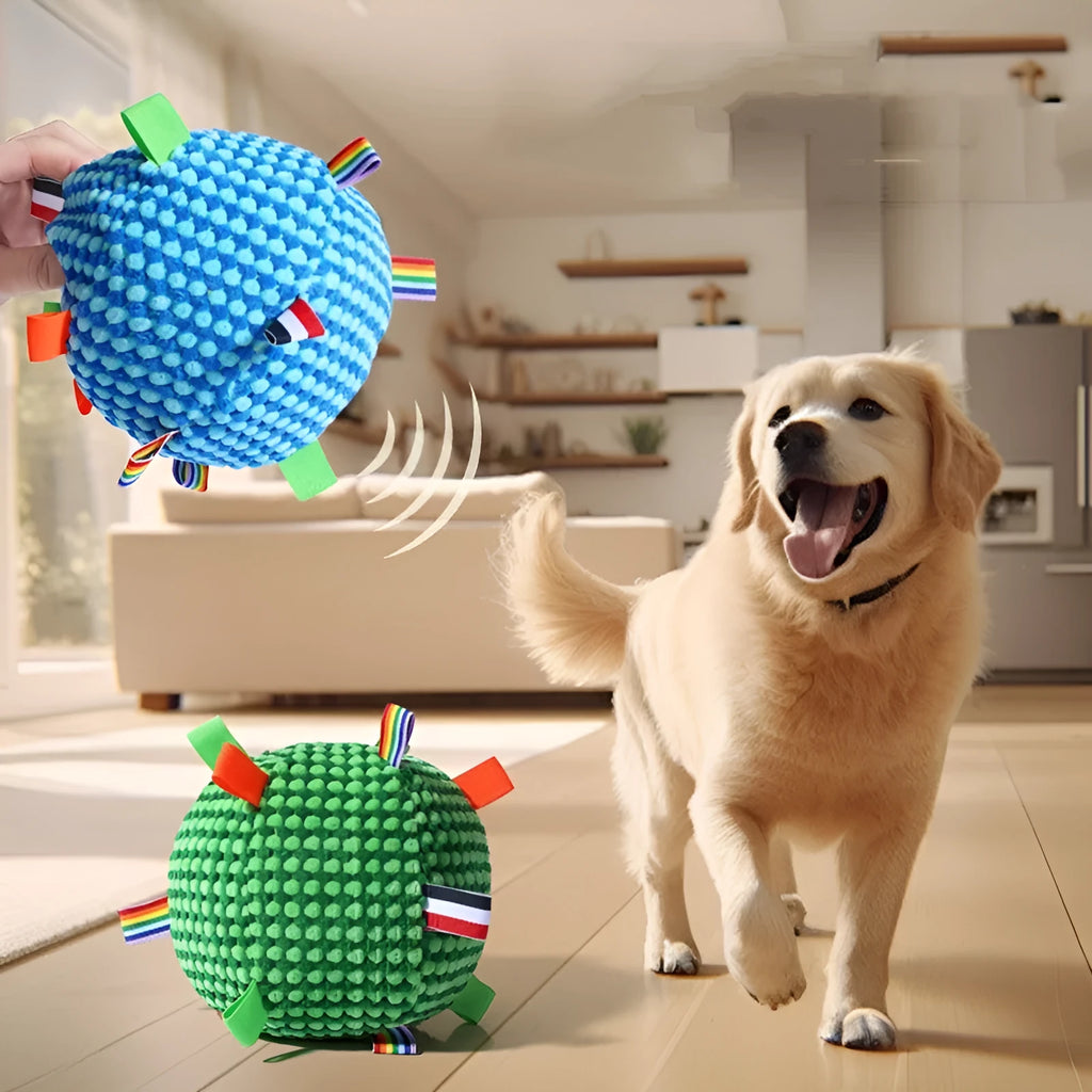 Blue hollow plastic dog ball with pineapple lattice pattern and rattle inside on grass