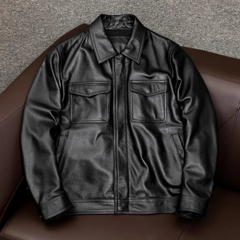 Men's black plus size lapel short leather jacket with side seam pockets, shown in a loose casual fit.