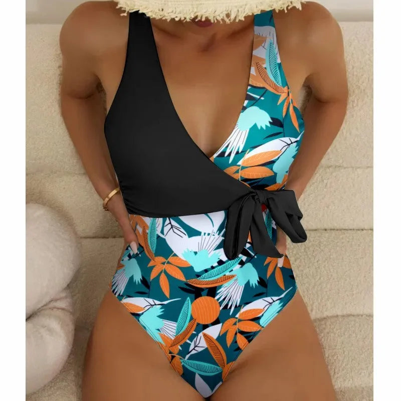Women's high waist one-piece swimsuit in a printed pattern, shown in black and white colour options.