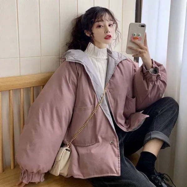 Reversible coat in pink or apricot, straight fit, medium thickness, polyester, sizes S to 2XL