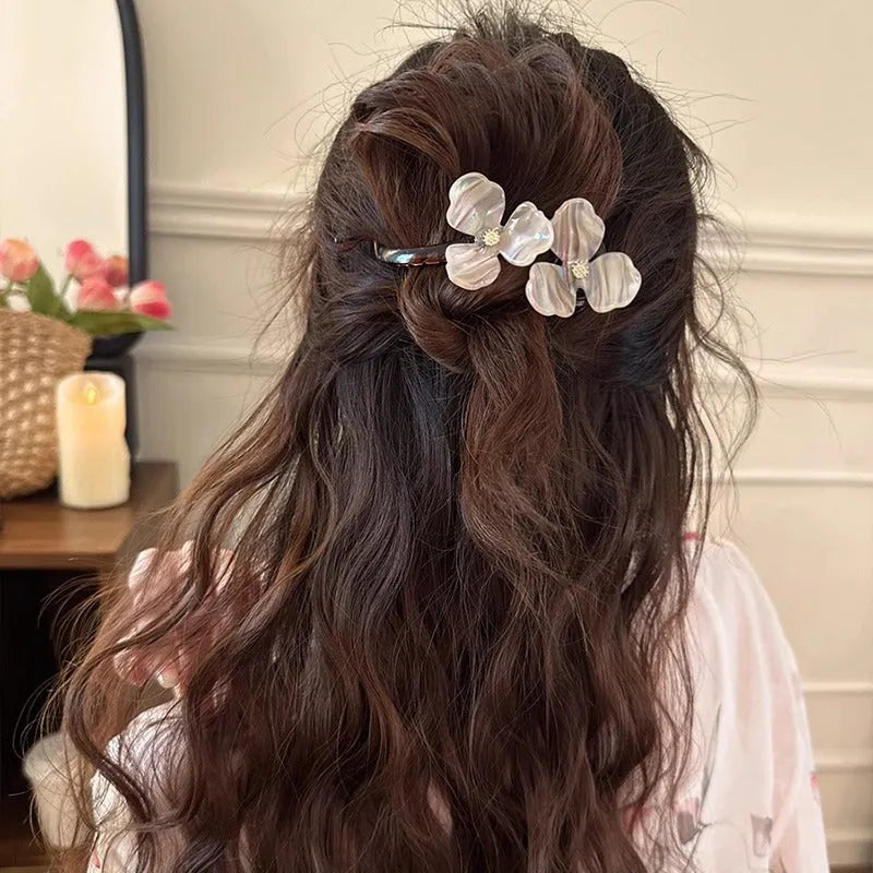 Retro flower bobby pin with acrylic petals for back head updos, available in blue, light blue, beige, or pink petals.