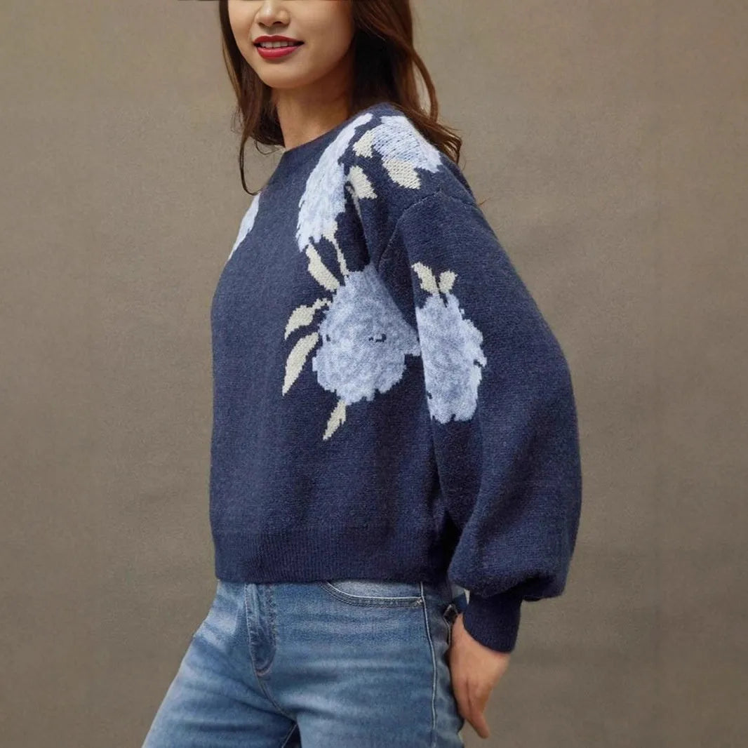 Sapphire blue women's off-neck pullover with a floral jacquard pattern and long sleeves.