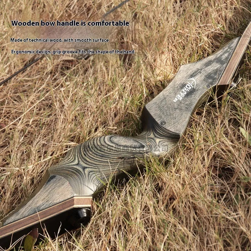 Traditional wooden recurve bow with colourful technology wood handle and multi-laminate limbs on display