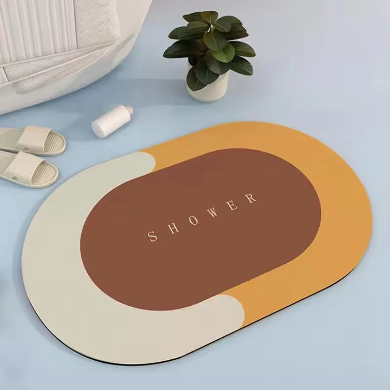 Super absorbent oval bath mat in grey with non-slip rubber bottom, 40x60cm