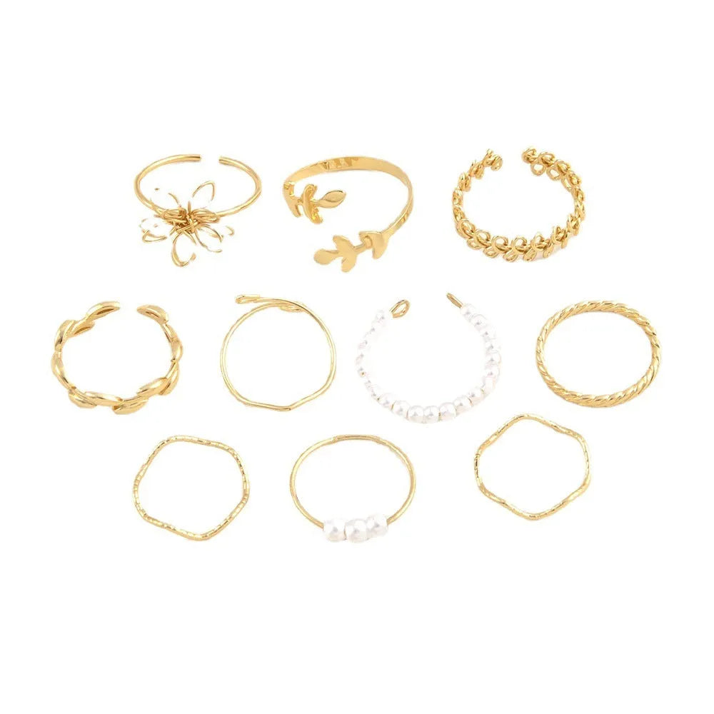 Openwork floral ring set with glossy electroplated finish in gold colour