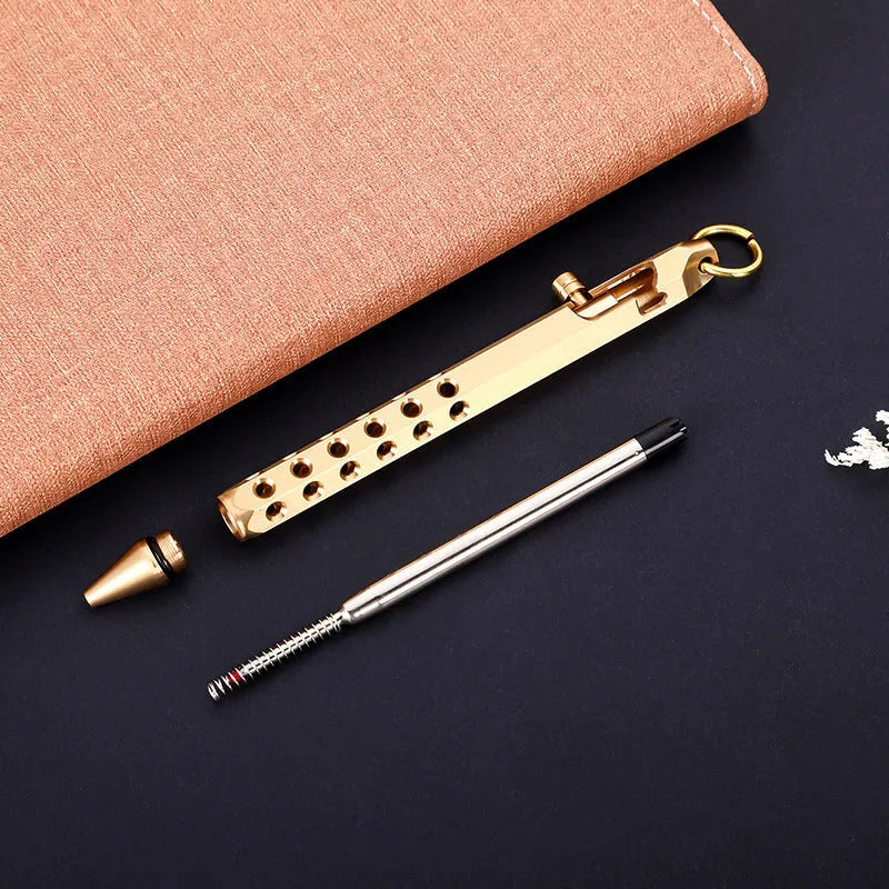 Brass hexagonal bolt action rollerball pen showing six-angle barrel and bolt mechanism