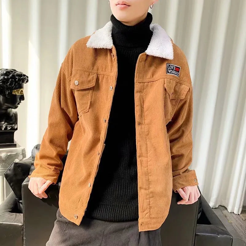 Men's loose-fit corduroy workwear jacket in khaki, shown with side stick pockets.