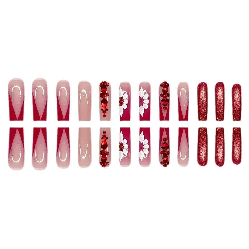 Press-on false nails with sweet flowers pattern and red diamond accents in European Square long style.