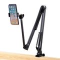 Black foldable metal desktop cantilever bracket holding a tablet, showing adjustable arm and clip.