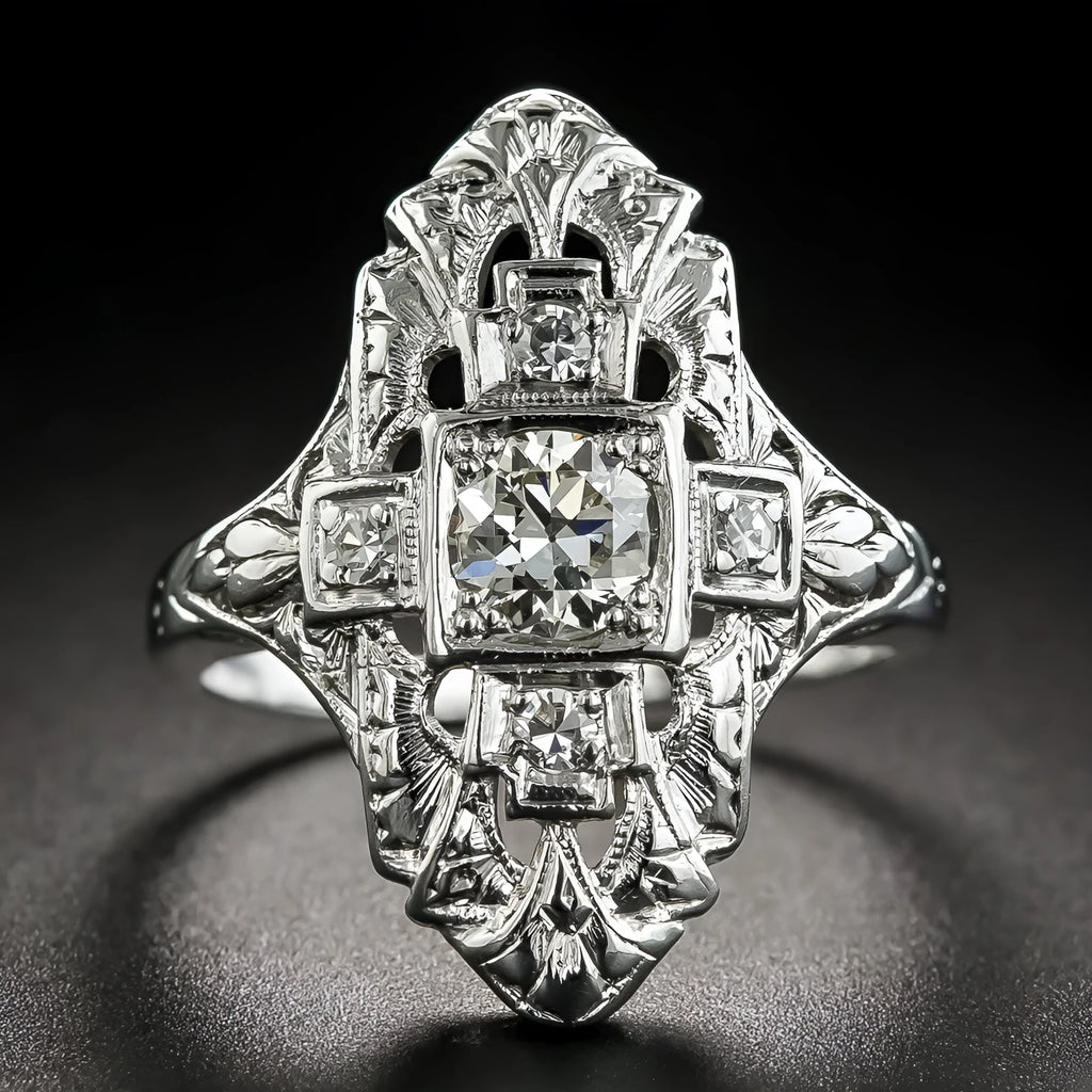 Hollow geometric silver-coloured ring with diamond studs on copper base