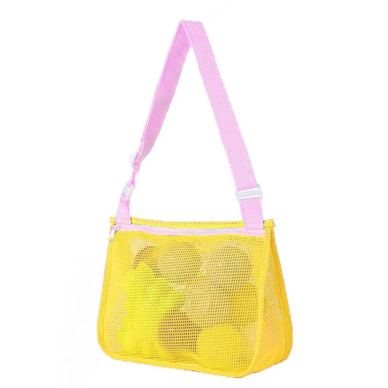 Blue nylon mesh travel storage bag with black handle and zip seal for children's clothing organisation