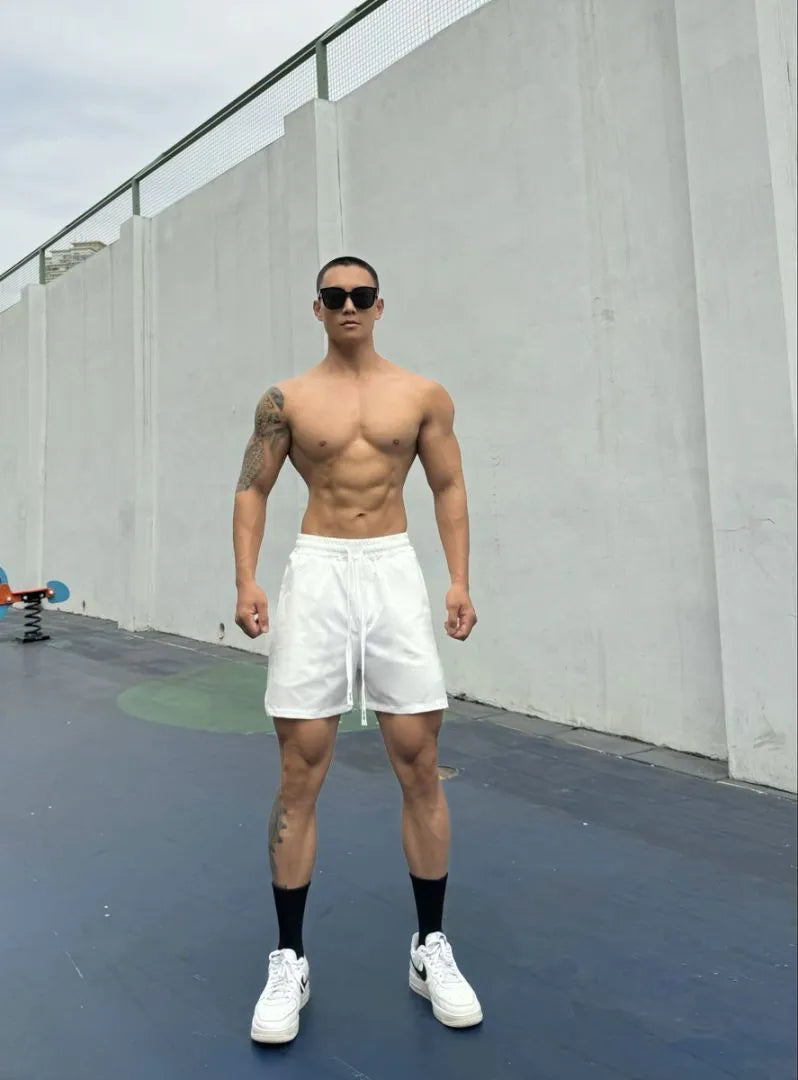 Men's ice silk quick-drying double-layer shorts in six colours with quarter-length design