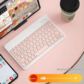 Bluetooth keyboard and optional wireless mouse in colours like white, green, pink, and lavender for tablet and PC use.