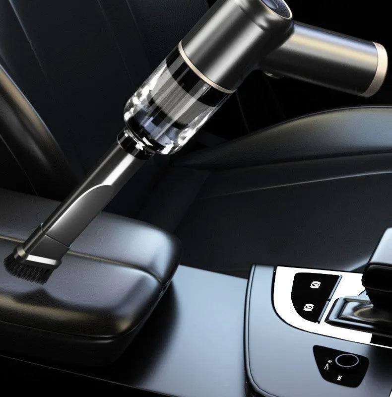 Black wireless handheld vacuum cleaner with multiple nozzle attachments for car and home use.