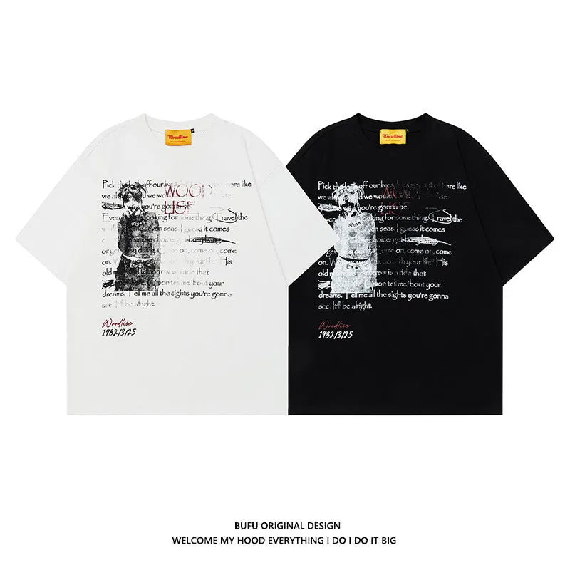 Men's black loose-fit pure cotton T-shirt with white printed letter design and raglan short sleeves.