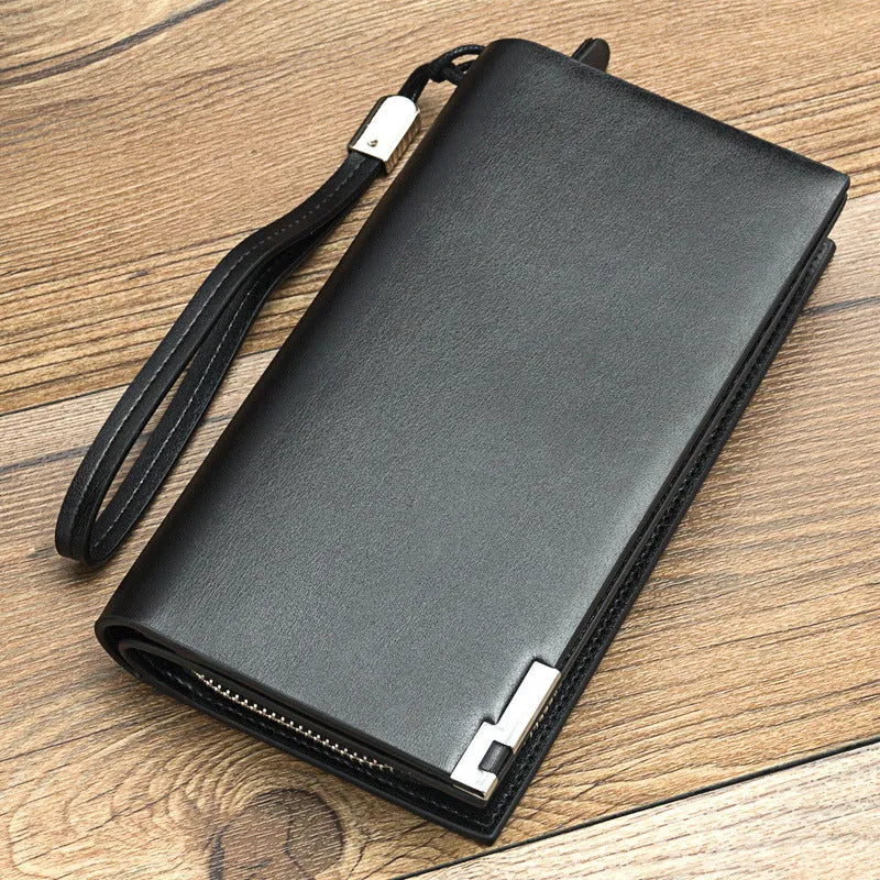 Men's long black PU leather wallet with a silver zipper closure laid flat