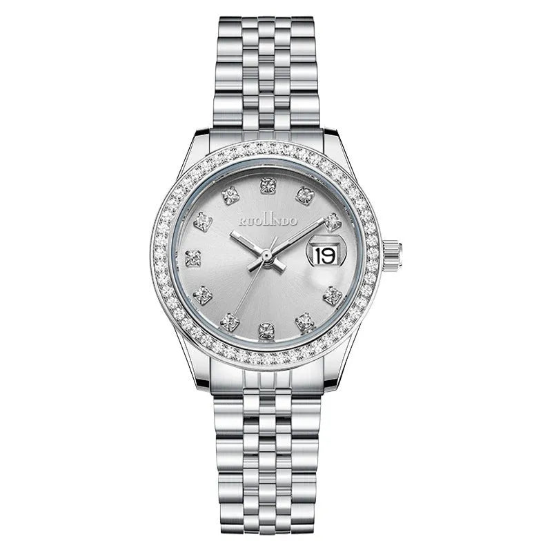 Women's silver quartz calendar watch with 32mm dial and stainless steel buckle