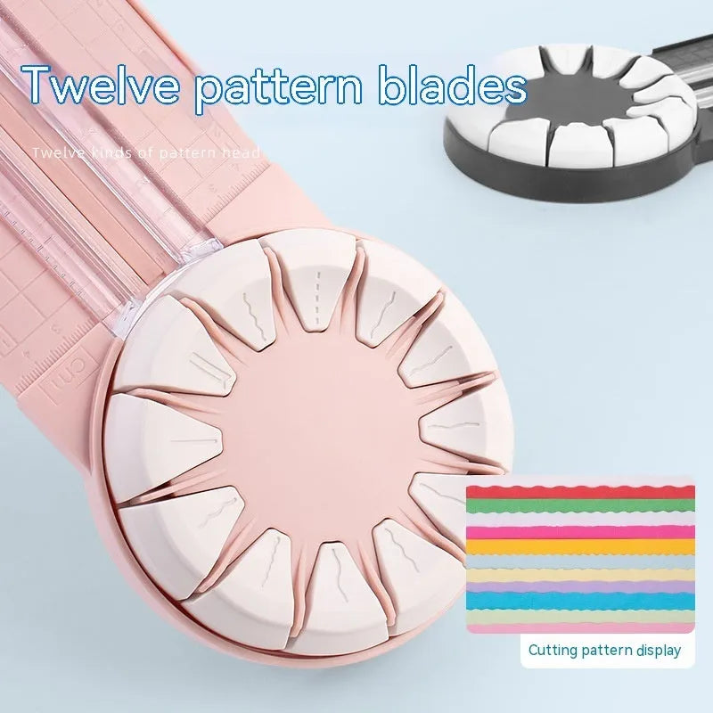 Pink plastic desktop paper cutting machine with a rotary blade for 12 different decorative edge patterns.