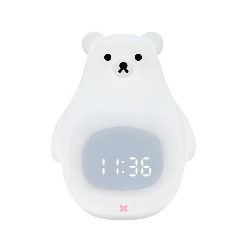 Big White Bear shaped silicone night light with colour-changing LED, showing remote control.