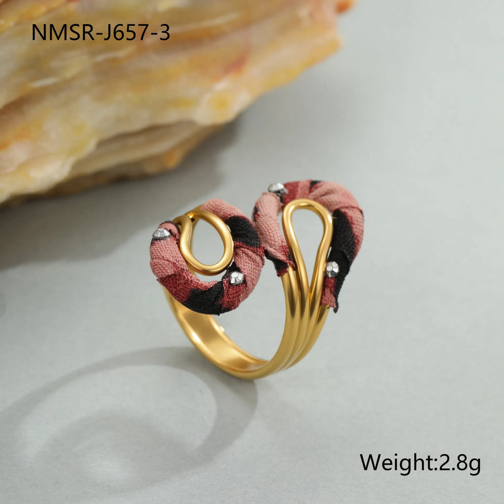 Geometric open mouth ring with leopard print design in electroplated stainless steel showing adjustable free-size construction