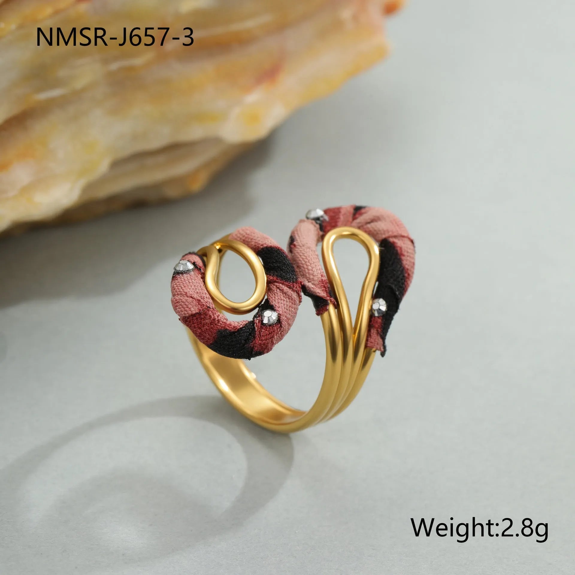 Geometric open mouth ring with leopard print design in electroplated stainless steel showing adjustable free-size construction