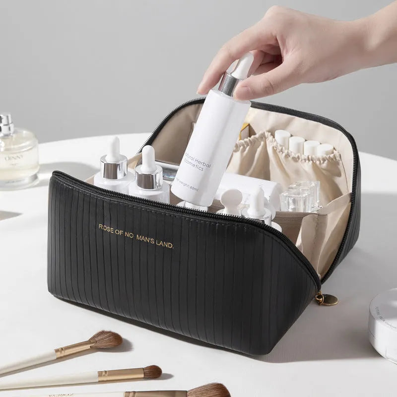 Vertical pattern pillow makeup bag in cubic shape with PU material, shown in available colours.