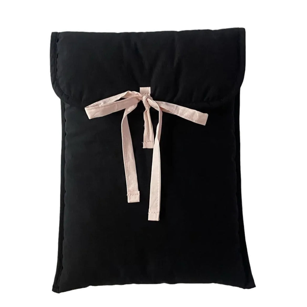 Black and white women's quilted nylon laptop bag with ballet bow in two size options.